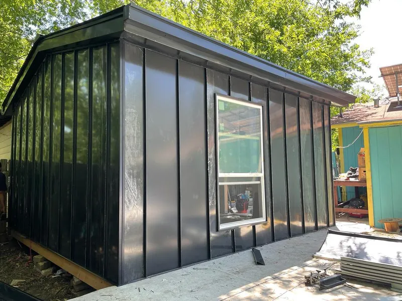 Black standing seam metal wall panels for Roof Inspection in Great Bend