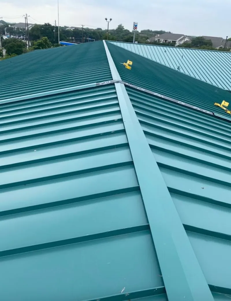 Green commercial metal roof ridge and valley for Metal Roof Repair in Great Bend
